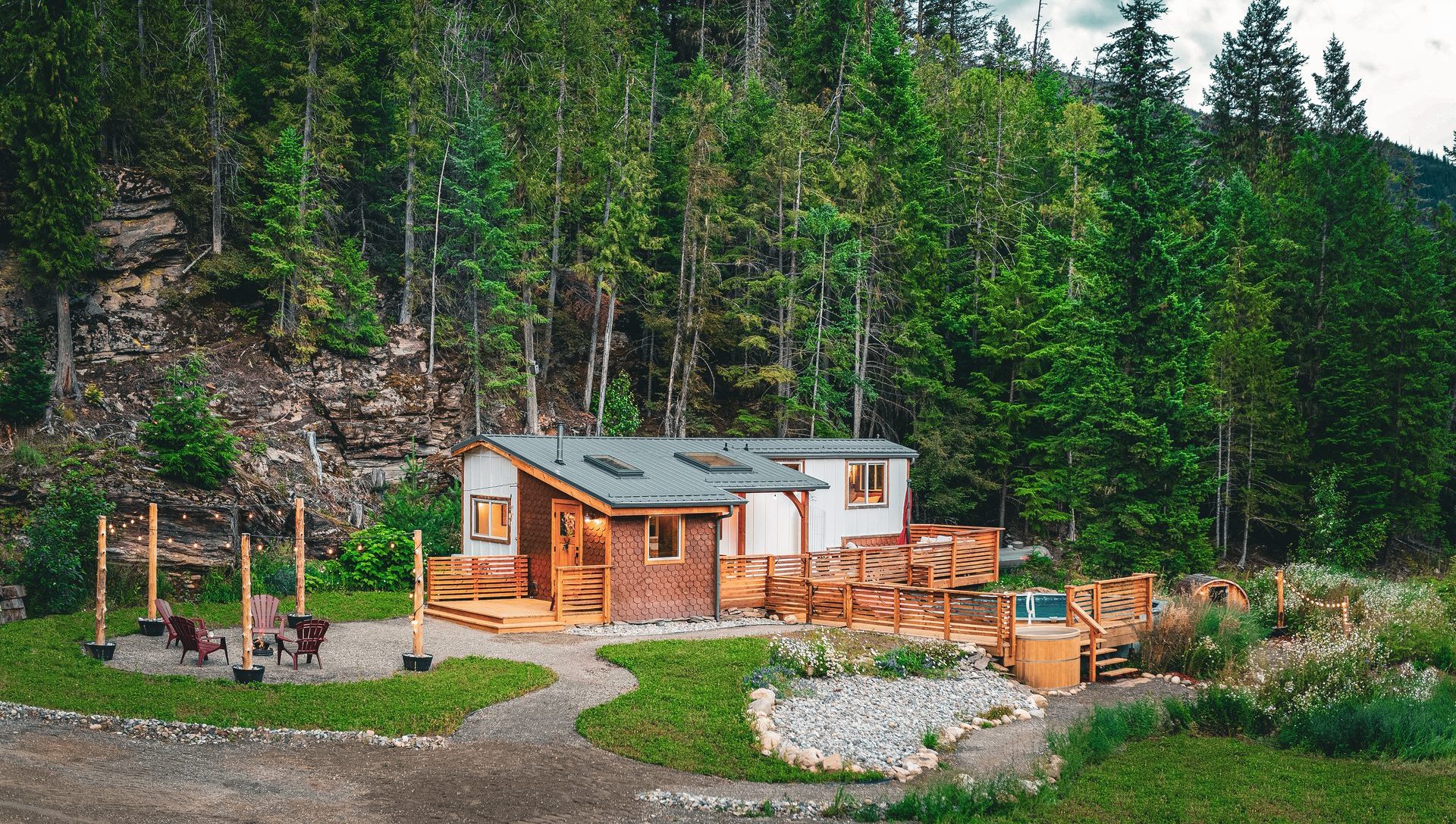 Enchanted Bluff House — luxury tiny home nestled among dramatic rock bluffs and forest