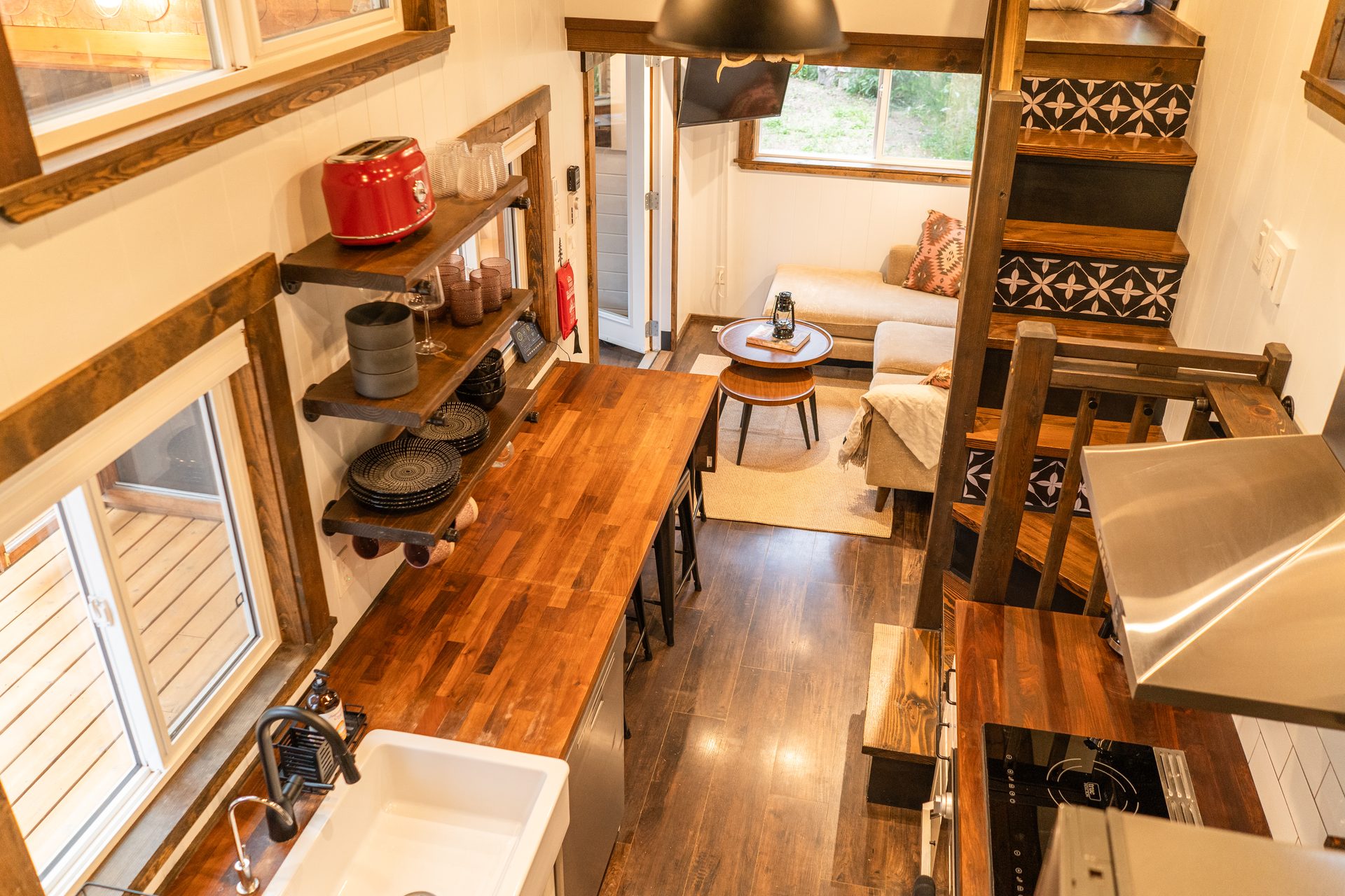 Fully equipped kitchen with butcher block counters and stainless steel appliances