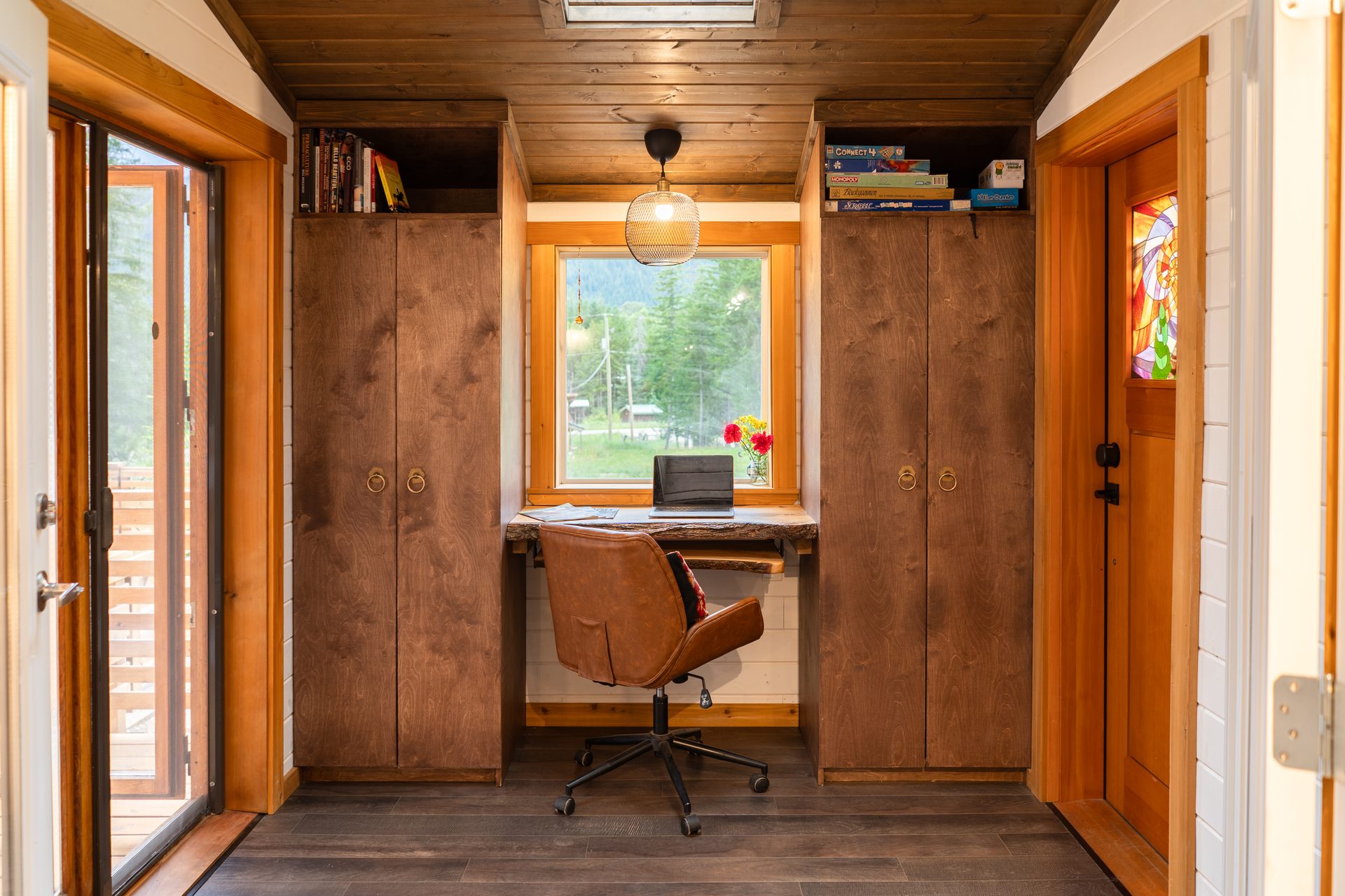 Cozy living room with sectional sofa and views to the deck