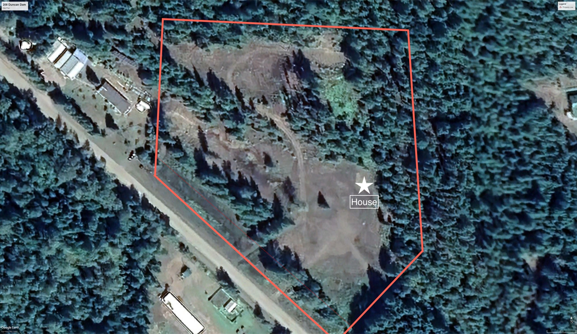 Aerial site plan of Enchanted Bluff House showing the 7-acre property boundary outlined in red, with the dwelling location marked by a star